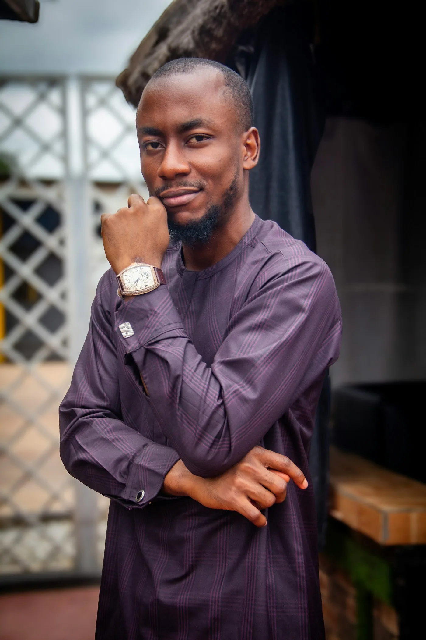A client in tailored traditional dress